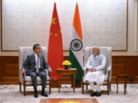 China Sends Foreign Minister to India, Seeking Ally Against Trump’s ‘Bullying’