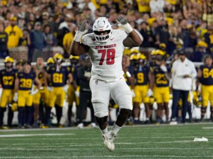 WATCH: New Mexico Lineman Shoves Michigan Player, Then Runs Away