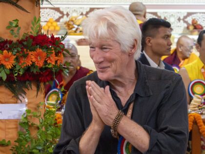 Actor Richard Gere arrives to attend an event to celebrate the 90th birthday of Tibetan sp