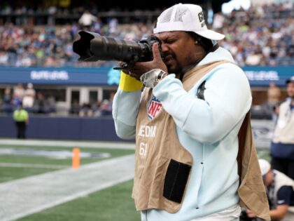 WATCH: Marshawn Lynch Throws Elbow to Protect Camera from Seahawks RB