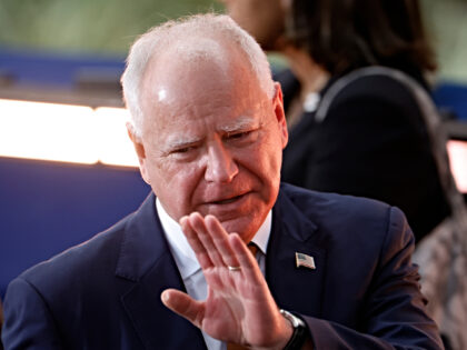 Democratic vice presidential nominee, Minnesota Gov. Tim Walz reacts as Democratic preside