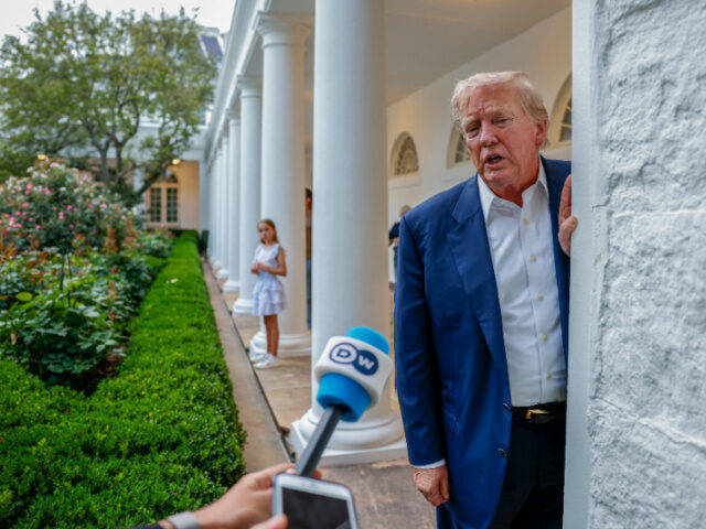 U.S. President Donald Trump speaks to press near the Rose Garden after returning to the Wh