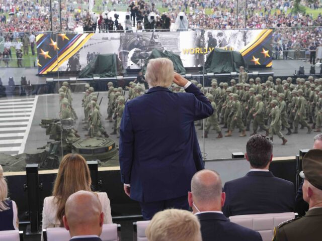 Trump salute (Doug Mills/The New York Times via Associated Press, Pool) President Donald Trump, center, salutes passing troops during a parade to honor the Army&#
