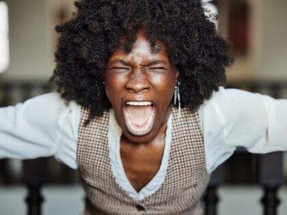 black woman screaming