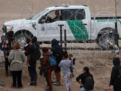 CIUDAD JUAREZ, MEXICO - FEBRUARY 06: Migrants cross the border to USA through Gate 36 and