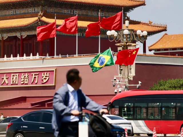 BEIJING, CHINA - MAY 14: The national flags of China and Brazil flutter at Tian'anmen Squa