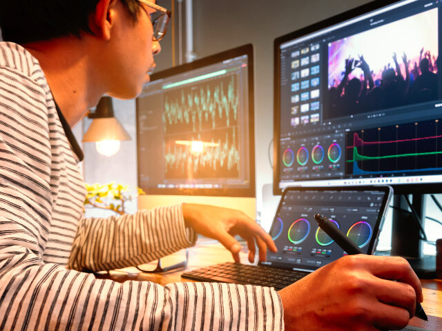 hollywoodai Filmmaker or movie video editor and colorist, working with footage or video on his persona