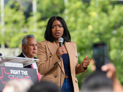HOUSTON, TEXAS - JULY 26: Congresswoman Jasmine Crockett speaks alongside other elected of