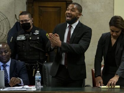 Actor Jussie Smollett speaks to Judge James Linn after his sentence is read Thursday, Marc