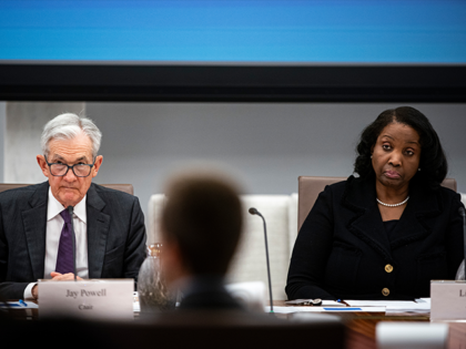 Federal Reserve Chair Jerome Powell and Governor Lisa Cook attend the Federal Open Market