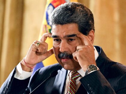 Venezuela's President Nicolas Maduro gestures as he speaks during a meeting at the Nationa