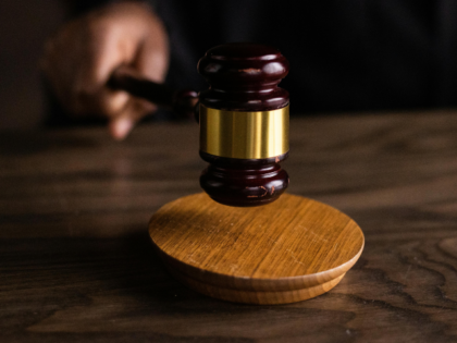Brown Wooden Gavel on Table