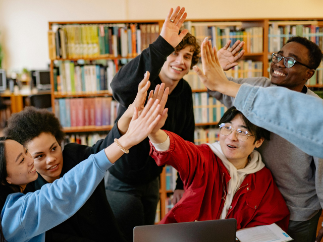 pexels-yankrukov-8199708 People Giving High Fives