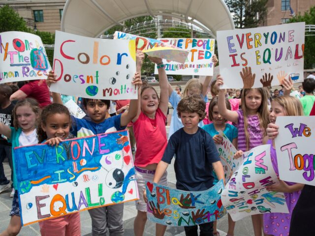 racial discrimination Asheville, North Carolina - Public school students from Isaac Dickson Elementary School pa