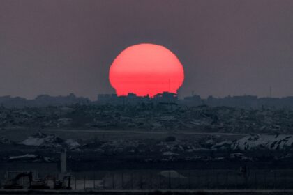The sun sets over the Gaza Strip on August 10, 2025
