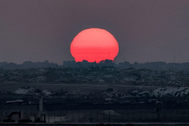 The sun sets over the Gaza Strip on August 10, 2025