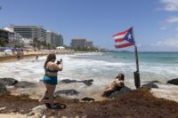 Hurricane Erin weakens to Category 3 as forecasters wait for northward turn