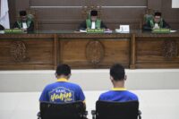 Islamic court in Indonesia sentences 2 men to public caning over sexual acts