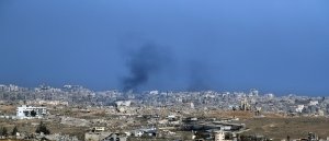 At least 61 killed in Gaza, amid anti-war protests in Israel