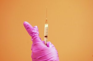 FDA signs off on new COVID vaccines but limits who will get them
