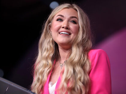 Erika Kirk speaking with attendees at the 2023 Young Women's Leadership Summit hosted