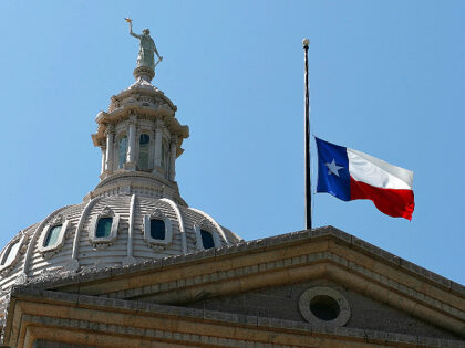Texas Flag at Half-Staff over capitol. (AP FILE PHOTO)