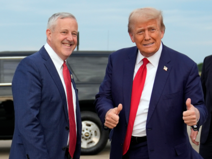 Republican presidential nominee former President Donald Trump stands with Republican Natio