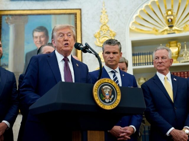 US President Donald Trump, center, speaks during an announcement in the Oval Office of the