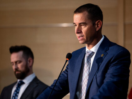 Utah Department of Public Safety commissioner Beau Mason, right, stands with FBI Special A