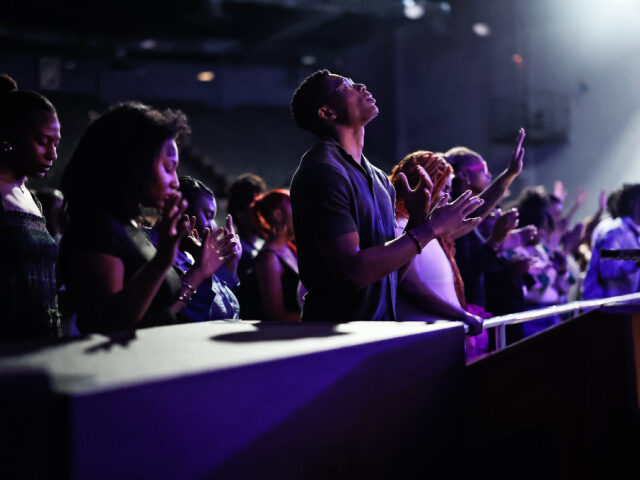 ackson State University students engage in praise and worship during the Tigerville Gospel