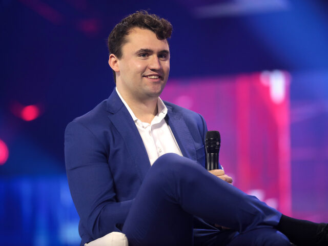 Charlie Kirk speaking with attendees at the 2022 AmericaFest at the Phoenix Convention Cen