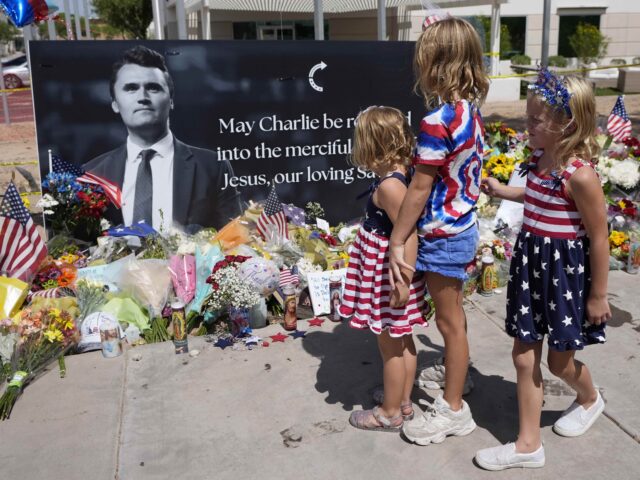 Charlie Kirk (Ross D. Franklin / Associated Press) Sisters Clara Hetland, 4, left, Haddie Hetland, center, 9, and Audra Hetland 6, of Surpris