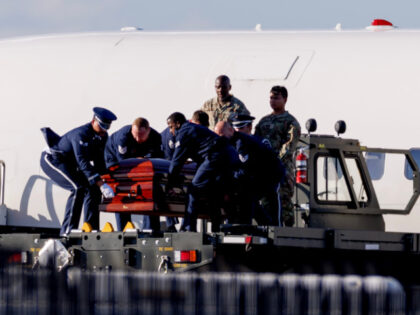 The casket containing the body of Charlie Kirk is removed from Air Force Two at Phoenix Sk