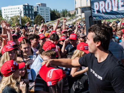 US conservative political activist and YouTuber, Charlie Kirk (C), founder of Turning Poin