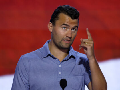 Turning Point USA Founder Charlie Kirk is seen onstage at the Fiserv Forum during preparat
