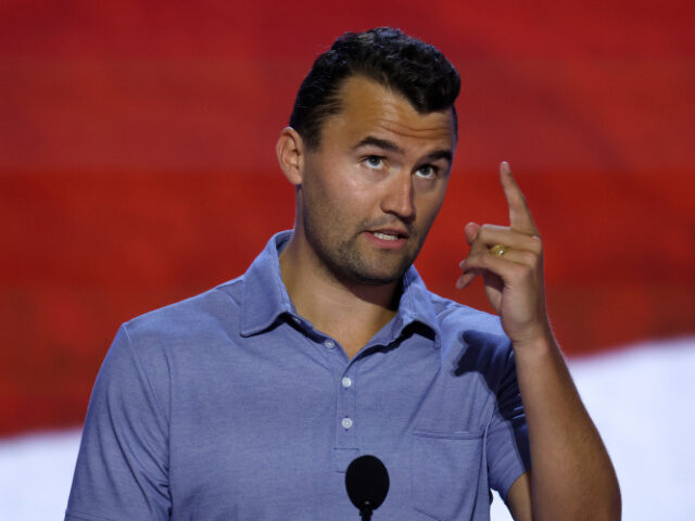 Charlie Kirk Points Upward Turning Point USA Founder Charlie Kirk is seen onstage at the Fiserv Forum during preparat