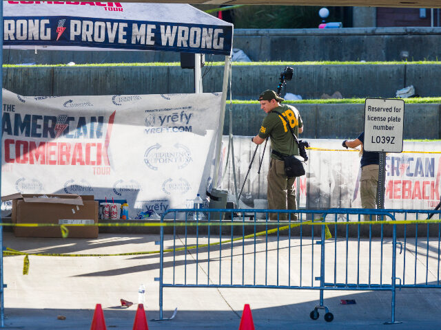 OREM, UTAH - SEPTEMBER 11: FBI agents walk through the courtyard at Utah Valley University