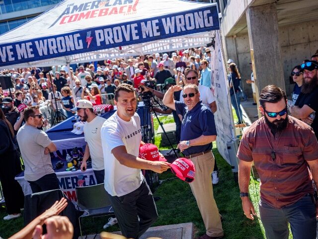 Charlie Kirk interacts with the crowd before his assassination