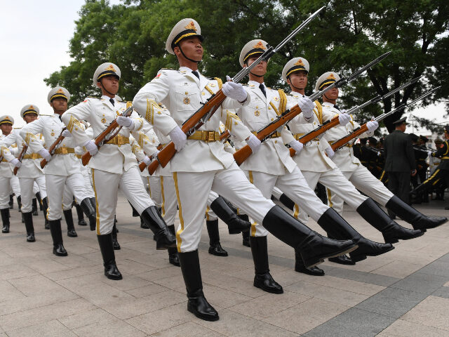 Chinese army Members of a Chinese military honour guard rehearse for a welcome ceremony for Uzbekistan