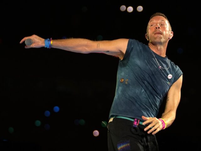 Chris Martin of Coldplay performs during Coldplay's Music Of The Spheres World Tour a