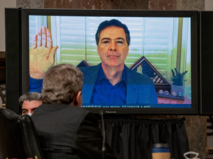 Former FBI director James Comey is sworn via videoconference before testifying during a Se