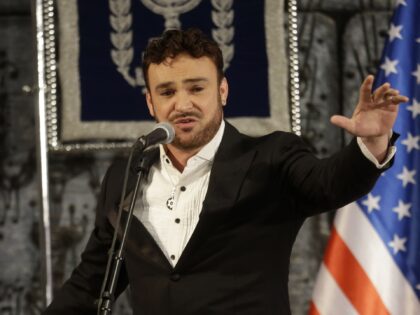 Israeli singer David D'Or, performs "Amazing Grace" at the State Dinner in