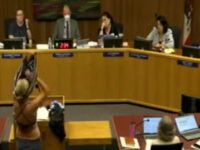 Woman Strips Down to Bikini at California School Board Meeting to Protest Allowing Males into Girls