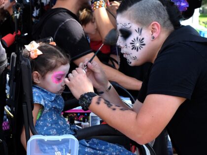 Three and half year-old Valencia Elena, from Long Beach, Calif. has her make-up done prior