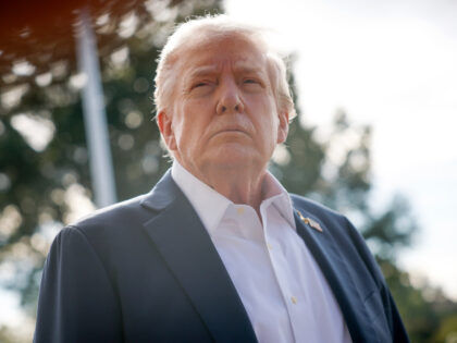 U.S. President Donald Trump speaks to members of the media as he departs the White House o