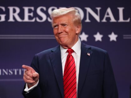 Donald Trump points at a crazy leftist