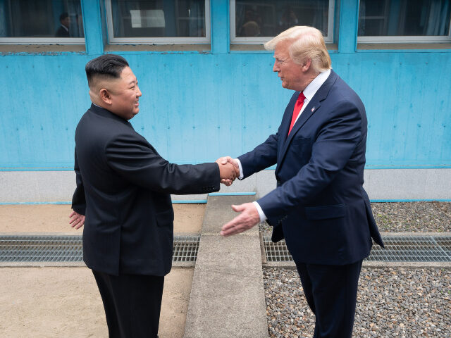 President Donald J. Trump shakes hands with Chairman of the Workers’ Party of Korea Kim
