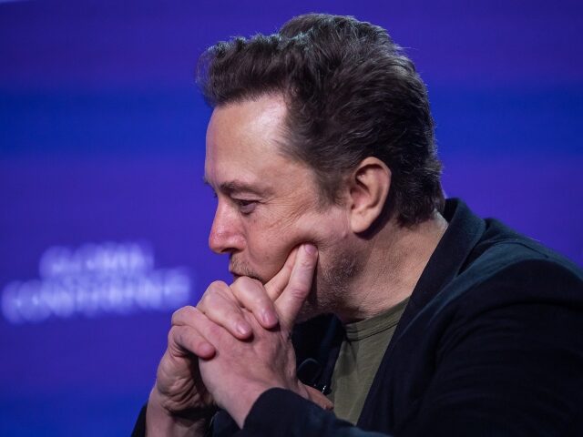 Elon Musk contemplates his full self-driving troubles