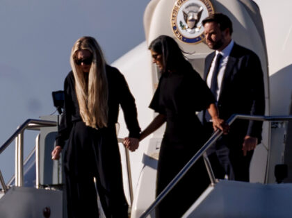 Vice President JD Vance (R) second lady Usha Vance (C) and Erika Kirk deplane Air Force Tw