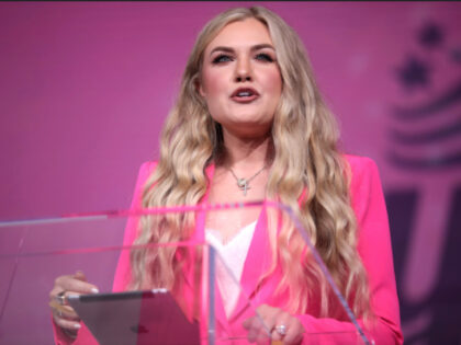 Erika Kirk speaking with attendees at the 2023 Young Women's Leadership Summit hosted